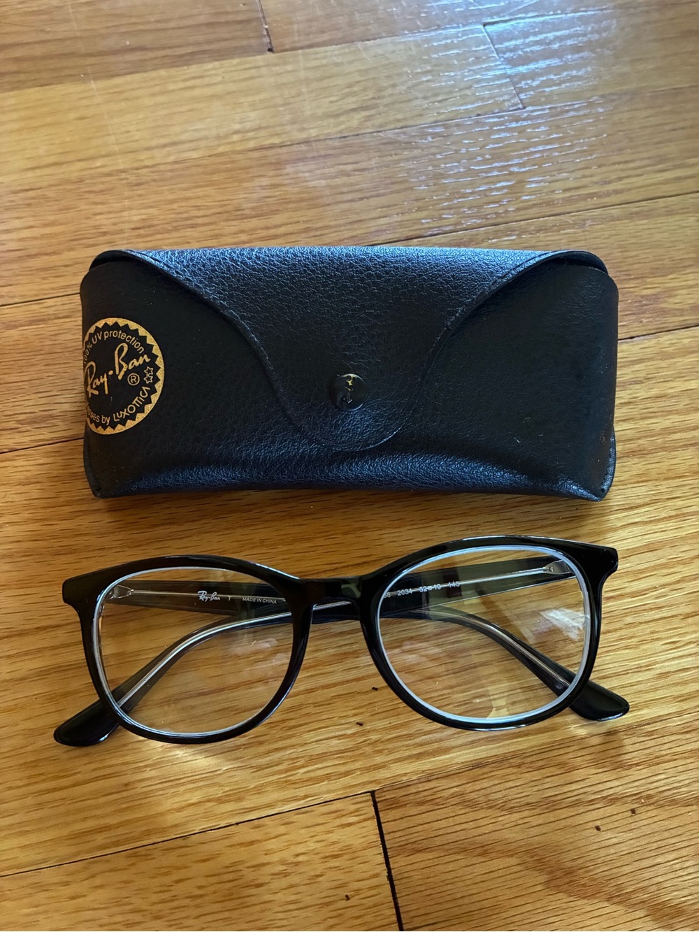 Ray-Ban Women's Black Round-Edge Optical Glasses with Case